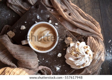 Coffee cup of cappuccino. Italian coffee drink. Double espresso, hot milk, and steamed milk foam