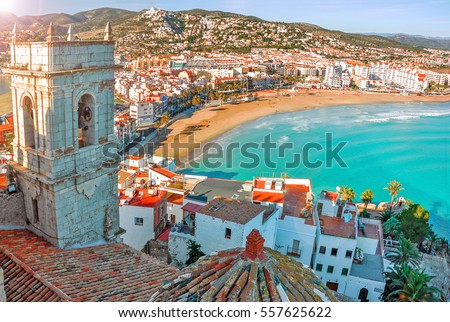 View of the sea from a height of Pope Luna's Castle. Valencian Community, Spain.  Peniscola. Castell. The medieval castle of the Knights Templar on the beach. Beautiful view of the sea and the bay. Royalty-Free Stock Photo #557625622