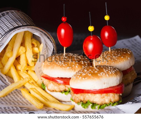 Appetizing hamburger and fried potatoes
