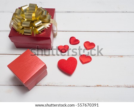 Valentine festival , New year  gift box and red heart  on wood background for create idea copy space.