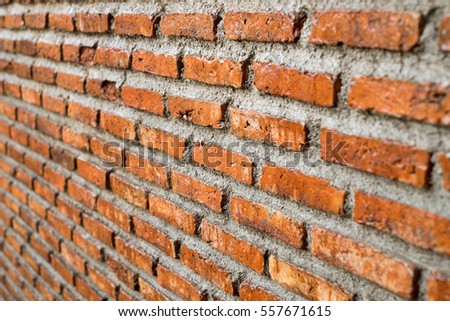 Red brick wall the side view texture background