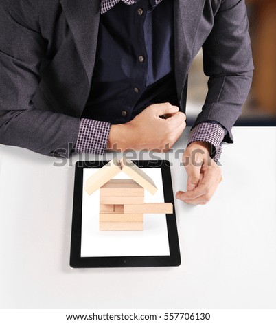 hands holding and pointing  contemporary digital tablet

