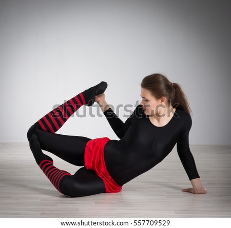 Girl is engaged in gymnastics