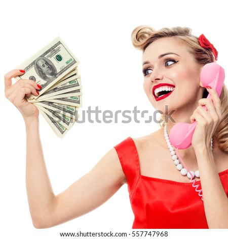 Happy woman with money, talking on phone, in pin-up style dress in polka dot, isolated on white background. Caucasian model posing in retro fashion and vintage concept shoot. Square composition.