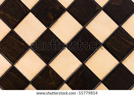 Wooden chessboard viewed from interesting angle