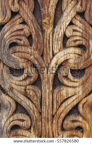 Norwegian ancient wooden carving. Nature forms. Heddal church. Norway. Vertical