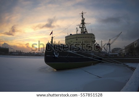 Ship Krasin, present time is a museum, used to be Russian (formerly Soviet) icebreaker, operated in polar regions, photo shoot with fish eye lens on the Neva embankment, Saint-Petersburg, Russia Royalty-Free Stock Photo #557851528