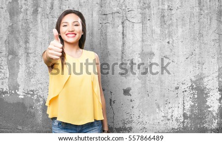 asian woman doing okay gesture