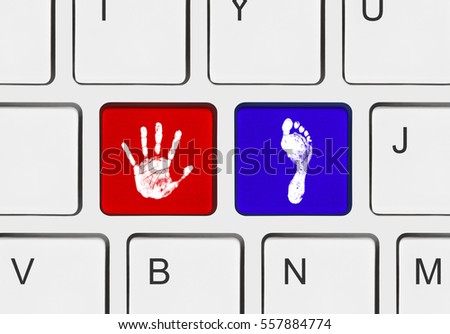 Computer keyboard with printout of hand and foot keys