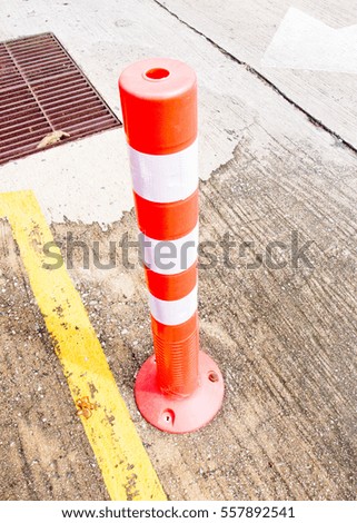 orange plastic safety cone warning sign symbol