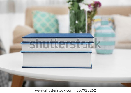 Stack of books on table, closeup