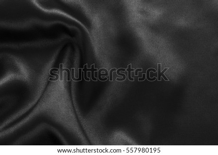 abstract background luxury cloth or liquid wave or wavy folds Royalty-Free Stock Photo #557980195