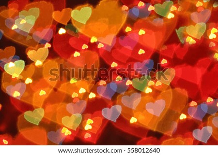  background texture of blurred lights in the shape of hearts