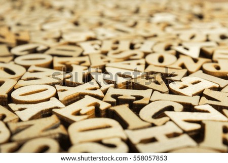 Close-up Letters of the alphabet made of wood for background