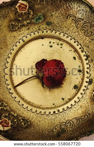 Antique plate with a rose  inside