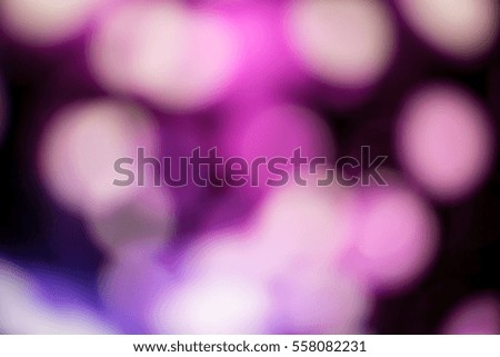 Blue and purple blur defocused of lights garland background
