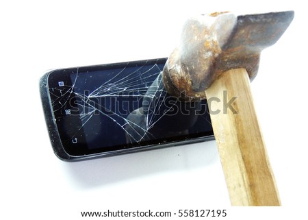 Broken phone screen and hammer on white background