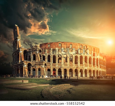 Rome, Italy. One of the most popular   place in world at sunny day - Roman Coliseum under sun light with blue sky.