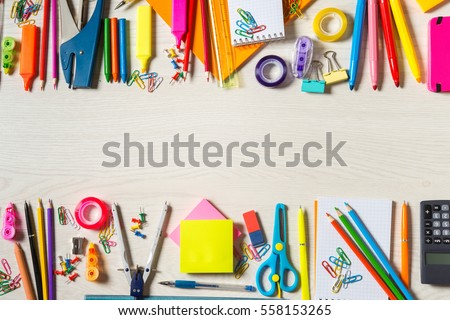 School stationery supplies, wide copy-space in the centre Royalty-Free Stock Photo #558153265