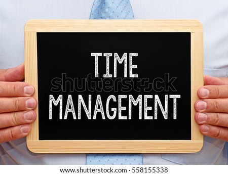 Time Management - Businessman with Chalkboard
