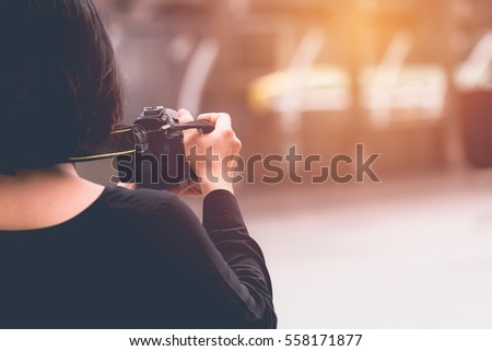Blurred image of photographer shoot photo in outdoor