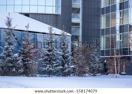 A thick layer of snow. Big city in Russia. A large business centre and business district. Contemporary Russia. Winter.