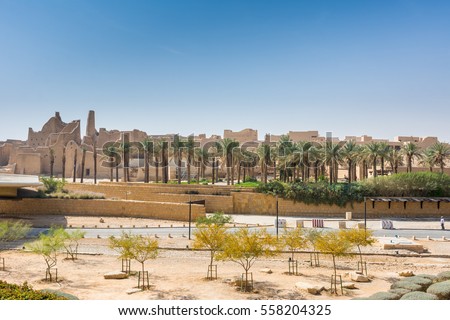 Palm trees and ruins of Diraiyah clay castle, also as Dereyeh and Dariyya, a town in Riyadh, Saudi Arabia, was the original home of the Saudi royal family, and the capital of the Emirate of Diriyah.