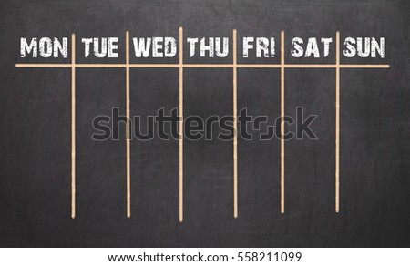 Weekly Calendar on chalkboard background. 7 day plan Royalty-Free Stock Photo #558211099