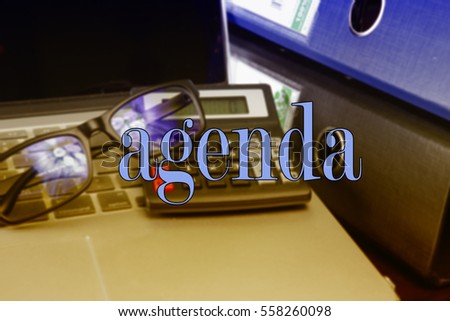 Agenda word, text  with business concepts background with note book and file in table