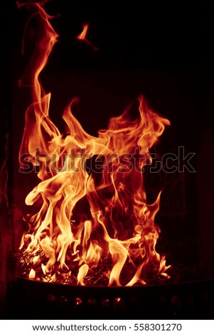 close up of burning fireplace at home