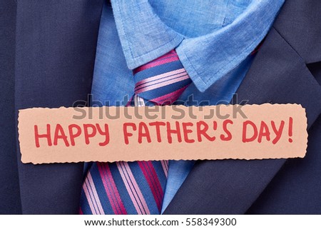 Greeting card on formal clothes. Happy Father's Day. Elegance in every detail.
