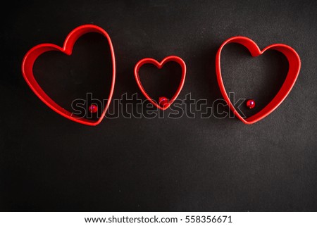 heart on a black background, on February 14 Valentine's Day