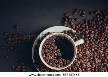 Coffee mug, coffee beans in a mug