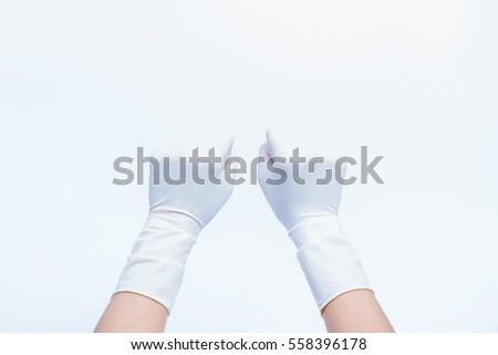Hand women asian fist symbol with glove of doctor isolated on white background