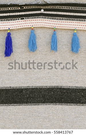 Grey thin striped wool plaid with blue fringe