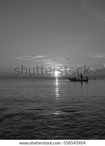 Fishermen fishing in the sea of black and white images