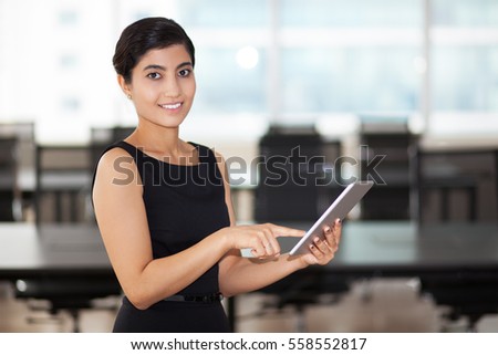 Closeup of Smiling Elegant Asian Lady Using Tablet