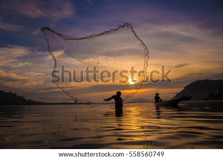 Fishermen using fishing nets.