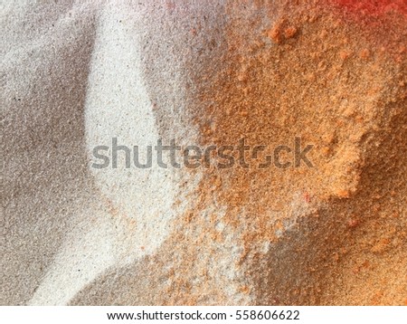 untouched orange and white sand/soil texture background.