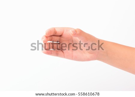 woman hand show holding something  isolated on white background. Royalty-Free Stock Photo #558610678