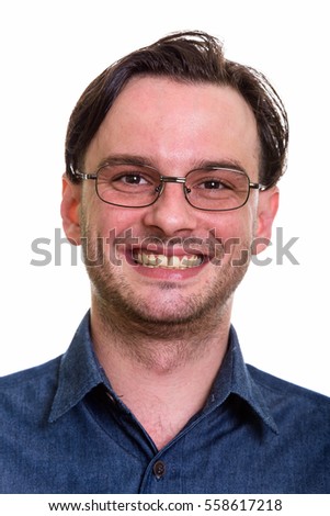 Face of formal young happy man smiling while wearing eyeglasses isolated against white background