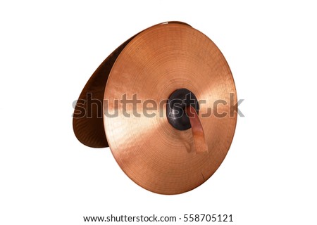 Close up of an prcussion cymbals with leather handle  isolated on background. Royalty-Free Stock Photo #558705121