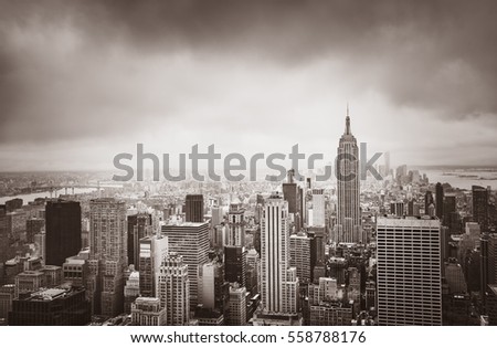 New York City skyline. Aerial view over Manhattan on a cloudy day. Sepia toned image. Old photo stylization. 