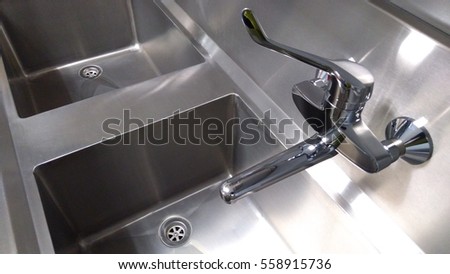 a double bowl stainless steel kitchen sink

