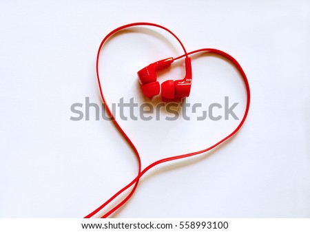Headphones earphones red heart shape on white background /  Love music