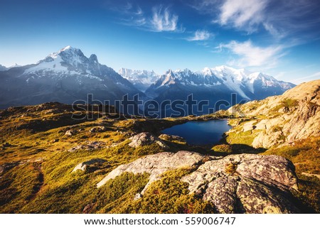 Views of the Mont Blanc glacier with Lac Blanc (White Lake). Popular tourist attraction. Picturesque and gorgeous scene. Location place Nature Reserve Aiguilles Rouges, Graian Alps, France, Europe.