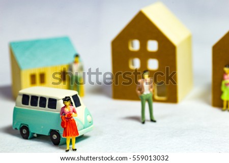 Car and cityscapes, houses and people