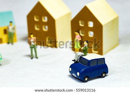 Car and cityscapes, houses and people