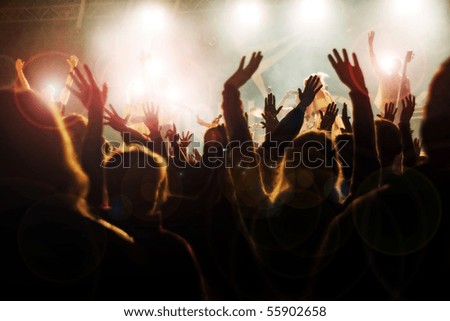 Crowd cheering at the music concert