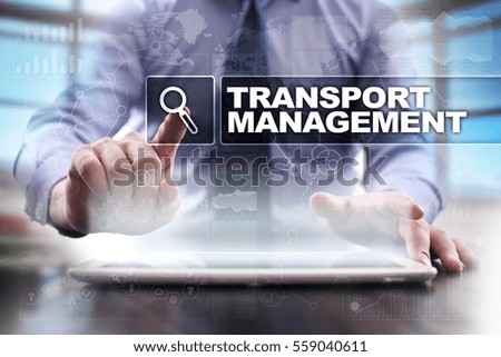 Businessman using tablet pc and selecting transport management.